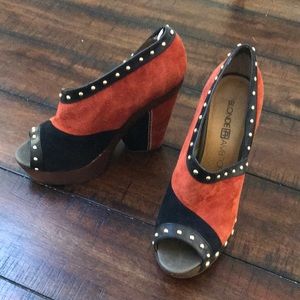 Blonde ambition orange and black suede shoes